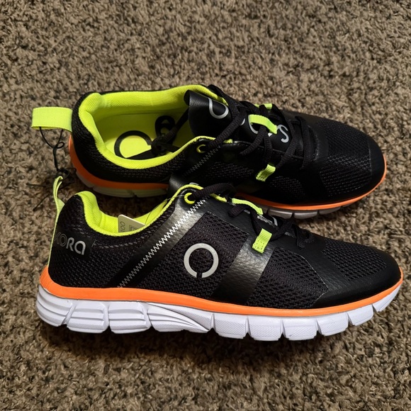 Black and Orange Athletic Shoes with Modern Design
